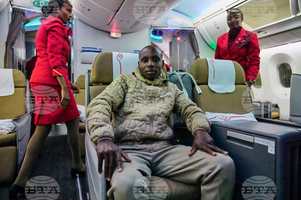 CORRECTION Kenya Marathon Record Breaker