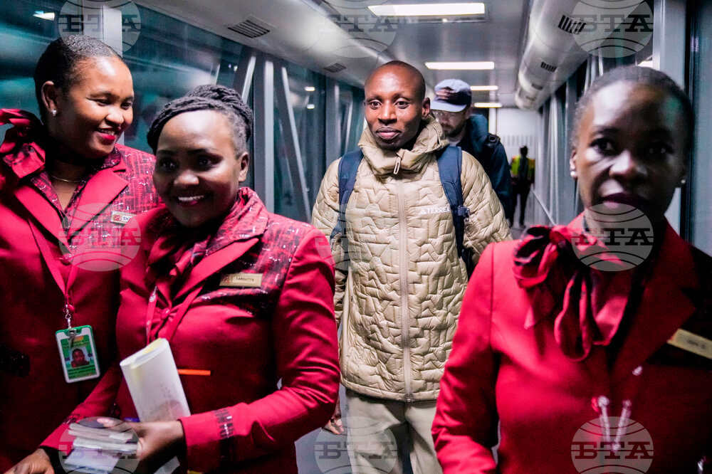 CORRECTION Kenya Marathon Record Breaker