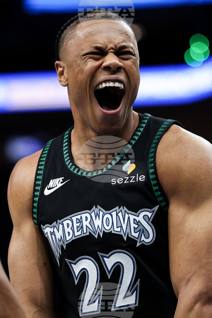 APTOPIX Nuggets Timberwolves Basketball
