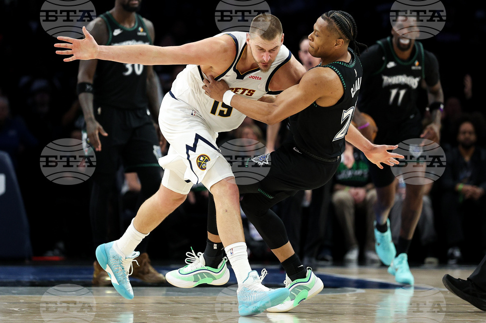 APTOPIX Nuggets Timberwolves Basketball