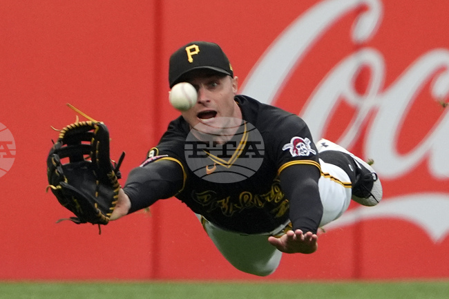 APTOPIX Reds Pirates Baseball