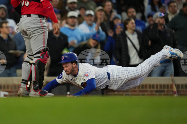 APTOPIX Reds Cubs Baseball