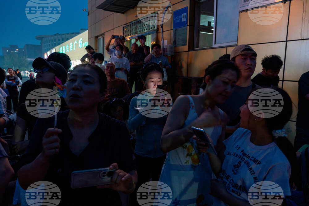 APTOPIX China Trump
