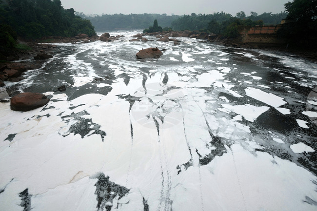 APTOPIX Brazil Polluted River