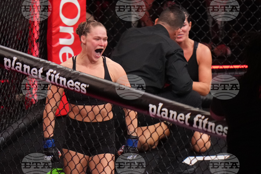 APTOPIX Rousey Carano Mixed Martial Arts