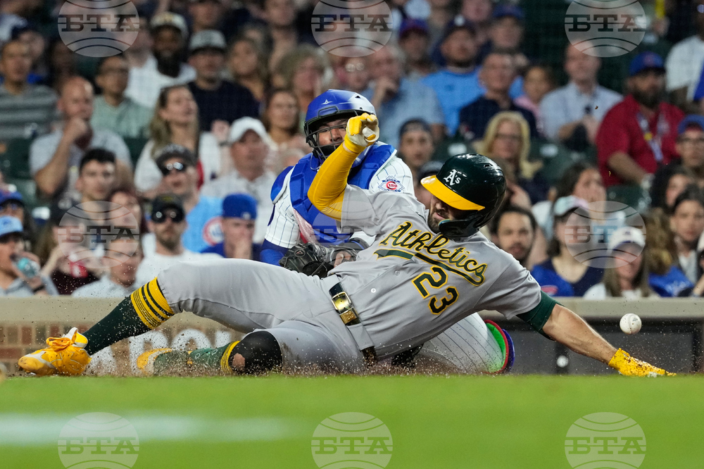 APTOPIX Athletics Cubs Baseball