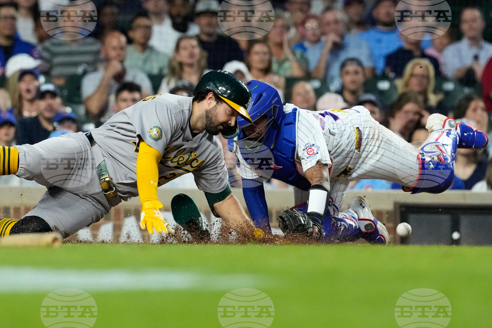 APTOPIX Athletics Cubs Baseball