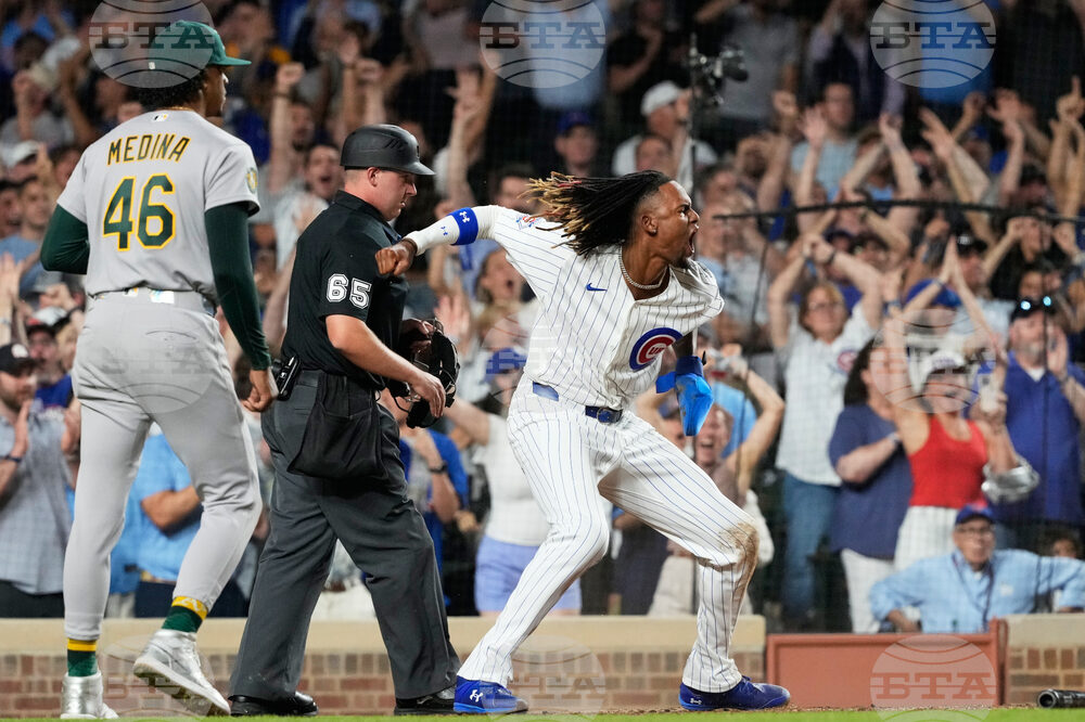 APTOPIX Athletics Cubs Baseball