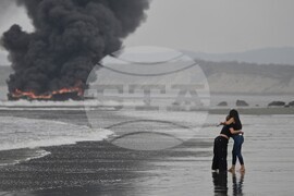 APTOPIX Ecuador Boats Fire