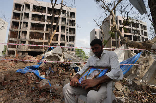 APTOPIX India Plane Crash Anniversary
