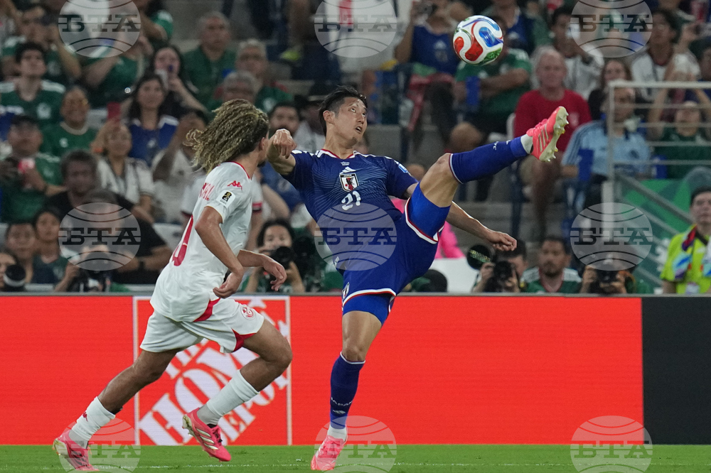 APTOPIX Japan Tunisia WCup Soccer