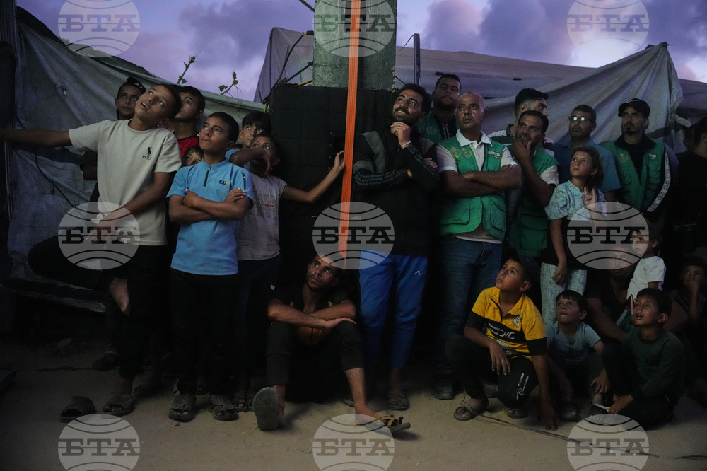 CORRECTION APTOPIX Palestinians Gaza WCup Soccer Reaction