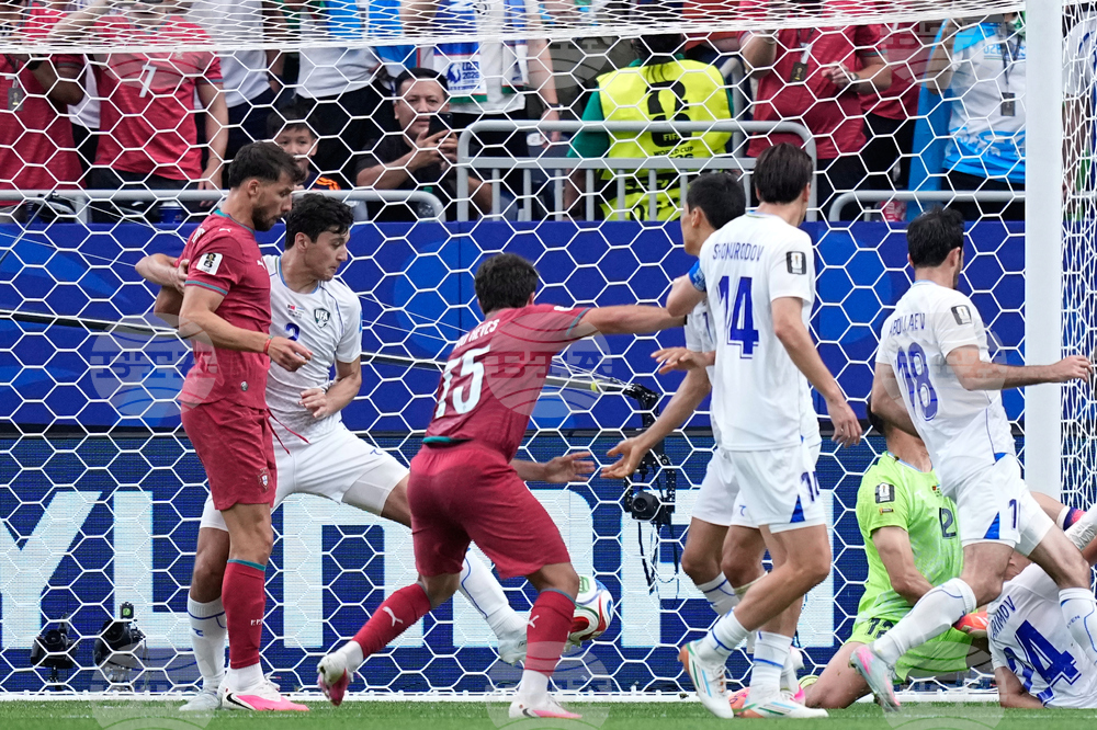 CORRECTION Uzbekistan Portugal WCup Soccer