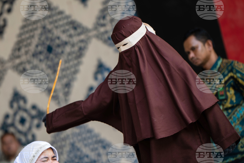 APTOPIX Indonesia Caning