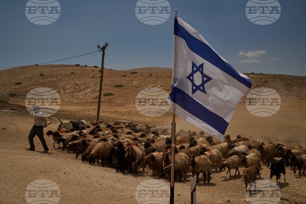 APTOPIX Palestinians West Bank Settlers Photo Essay