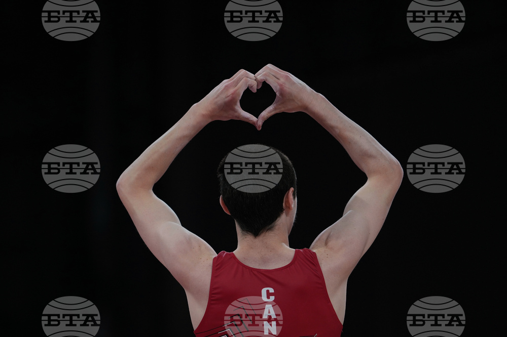 APTOPIX Britain Commonwealth Games Artistic Gymnastics