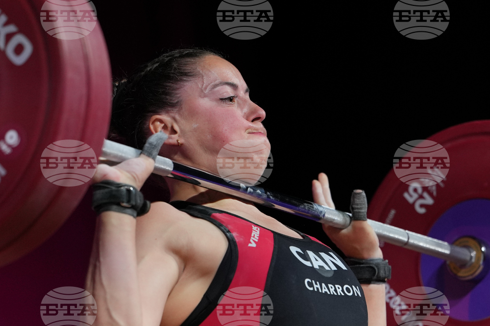 APTOPIX Britain Commonwealth Games Weightlifting