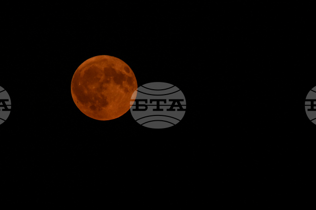France Wildfires Moon