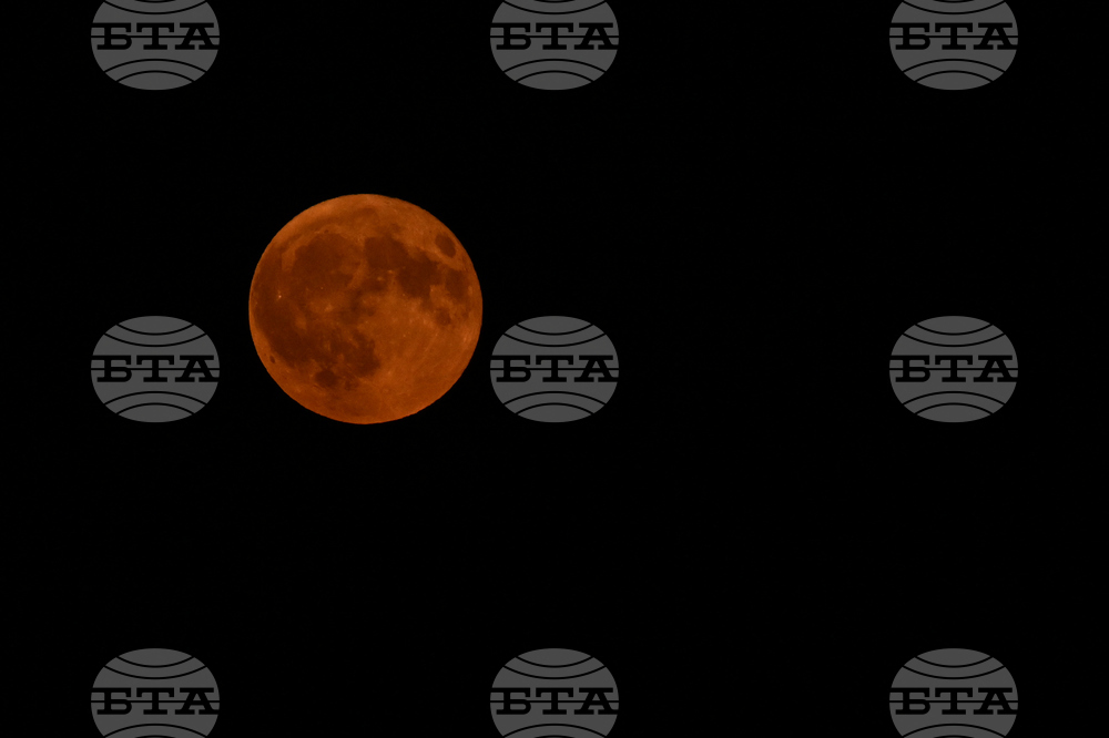 France Wildfires Moon