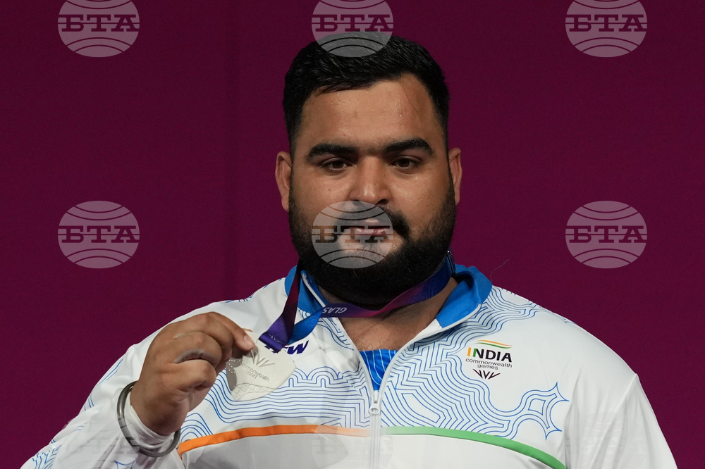 Britain Commonwealth Games Weightlifting