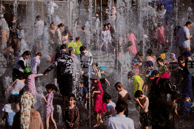 Israel Palestinians Extreme Weather Heat