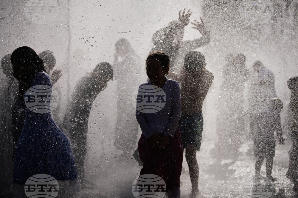 Israel Palestinians Extreme Weather Heat
