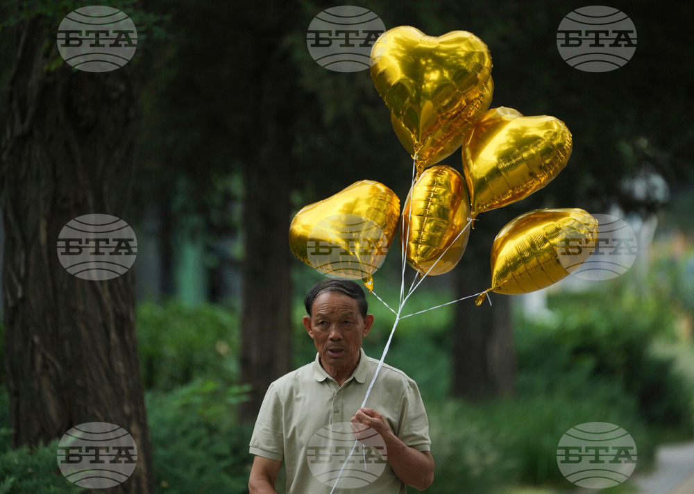 APTOPIX China Daily Life