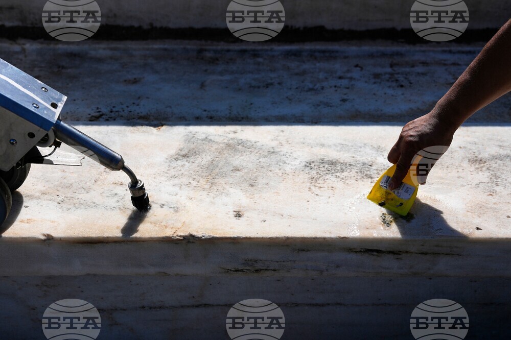 Greece Olympics Stadium Cleaning