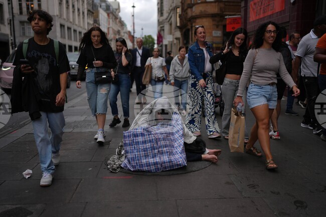 APTOPIX Britain Economy