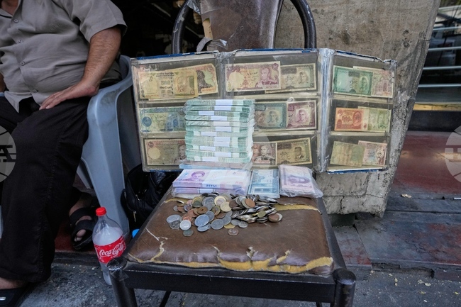 APTOPIX Iran Currency