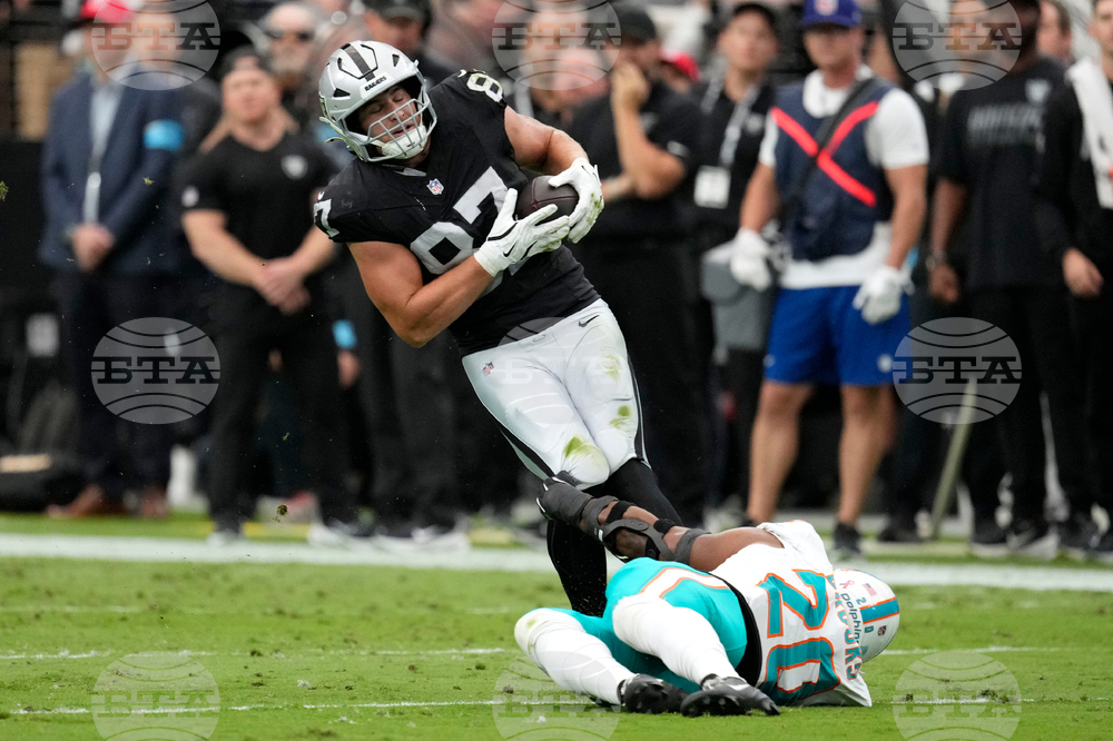 Dolphins Raiders Football