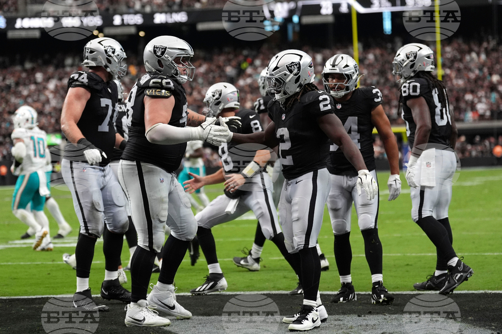 Dolphins Raiders Football