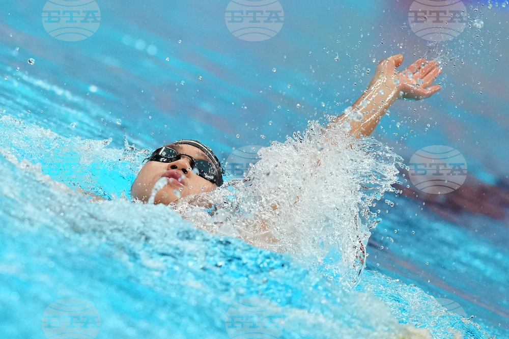 APTOPIX Asian Games Swimming