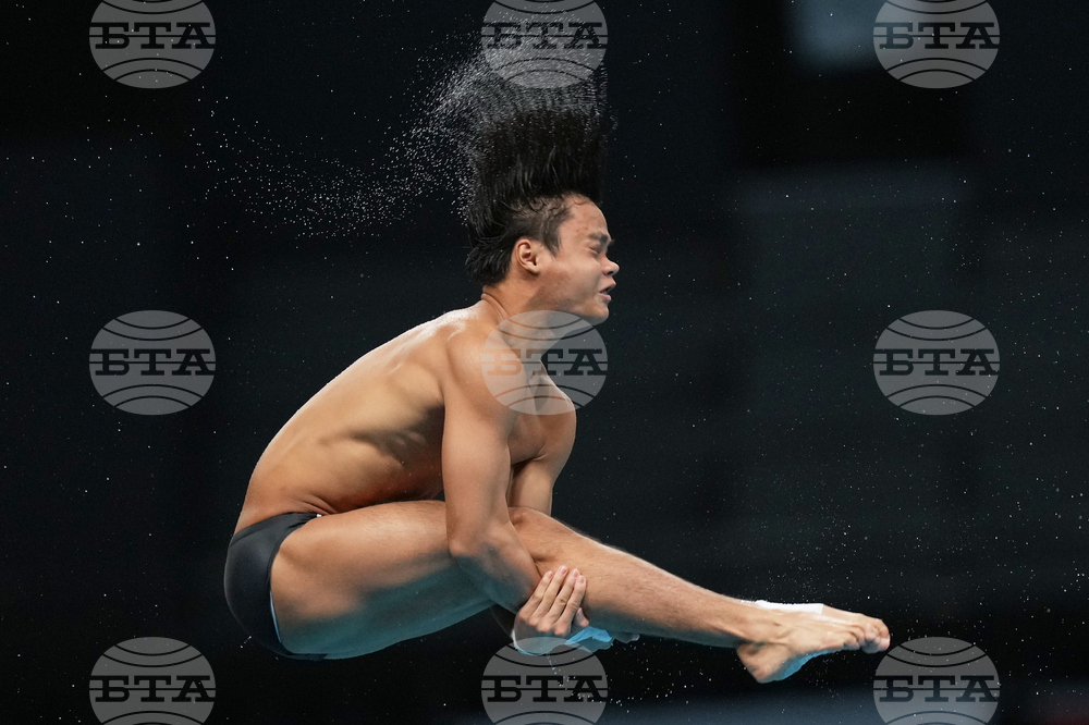APTOPIX Asian Games Diving