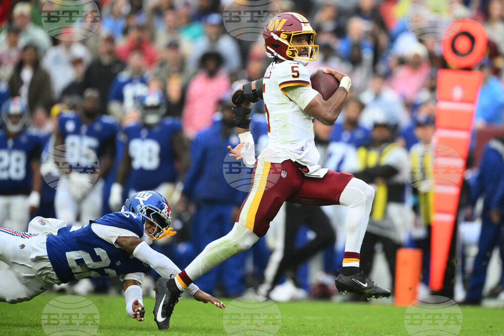 APTOPIX Giants Commanders Football