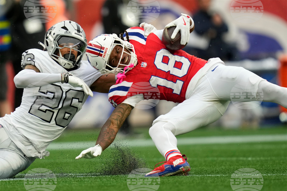 APTOPIX Raiders Patriots Football