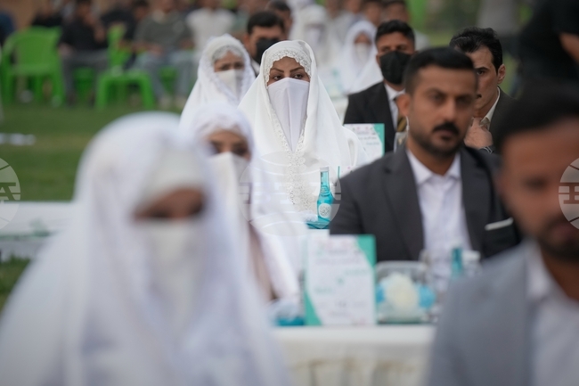 APTOPIX Iraq Mass Wedding