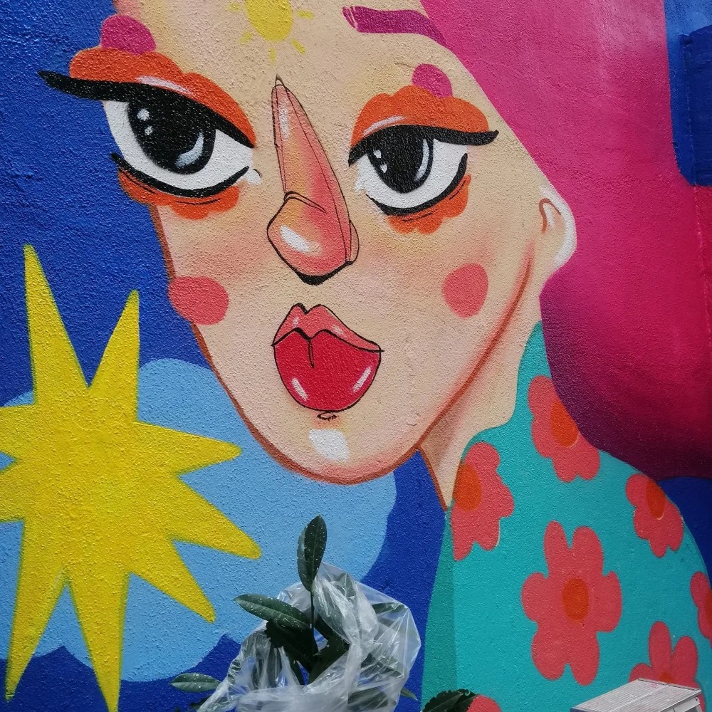 BTA :: Female Street Artist Creates Mural Against Domestic Violence