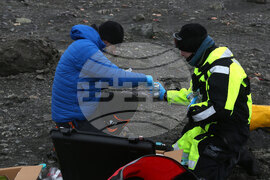 Group of Scientists from 32nd Antarctic Expedition Work on Projects at Ereby Point