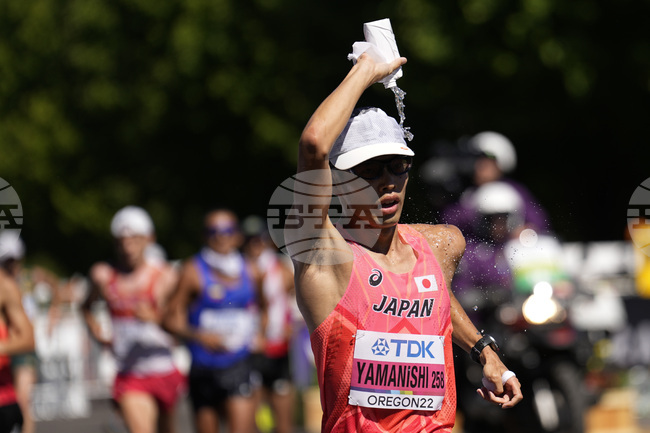 Японецът Тошиказу Яманиши  постави нов световен рекорд на полумаратона по ходене в Кобе