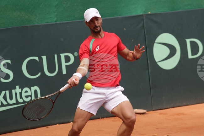 Тенис - Купа „Дейвис“ -  Димитър Кузманов - Лейтън Кроние