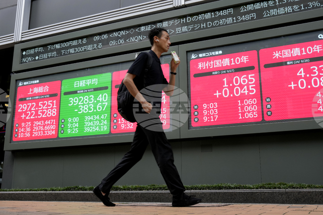 Токио затвори низходящо поради регистрираните печалби, след като Nikkei надвиши 50 000 пункта, а Уолстрийт отчете ръст