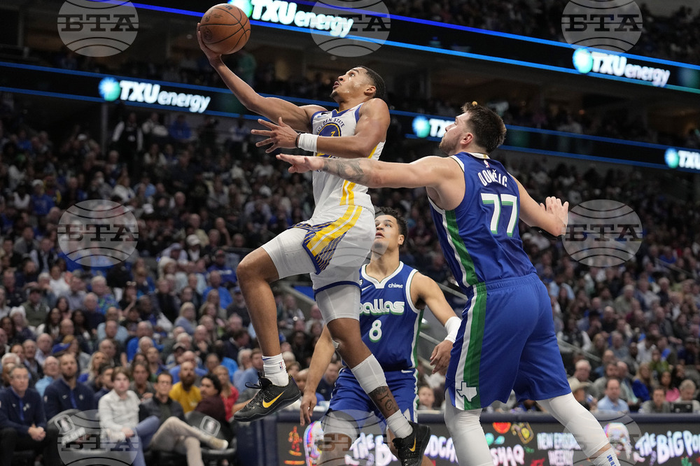 APTOPIX Warriors Mavericks Basketball