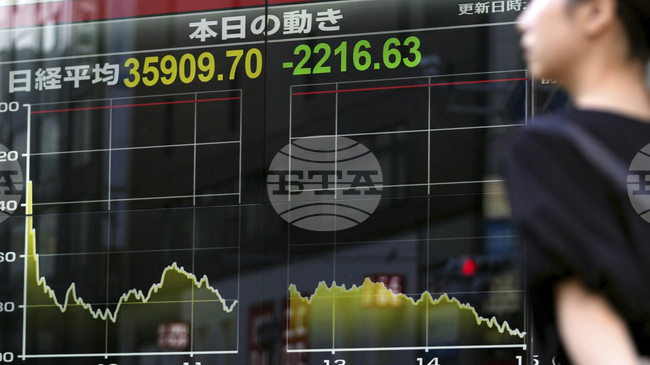 Борсата в Токио затвори с рекордни максимуми, основните индекси на Уолстрийт се сринаха
