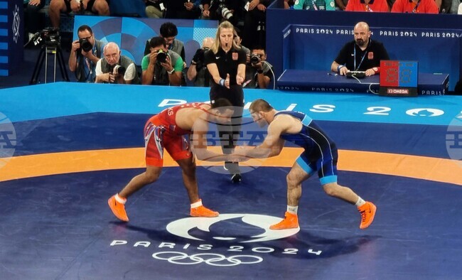 Франция - XXXIII Летни олимпийски игри - борба свободен стил - Магомад Рамазанов
