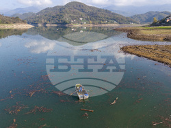 APTOPIX Bosnia Lake Waste